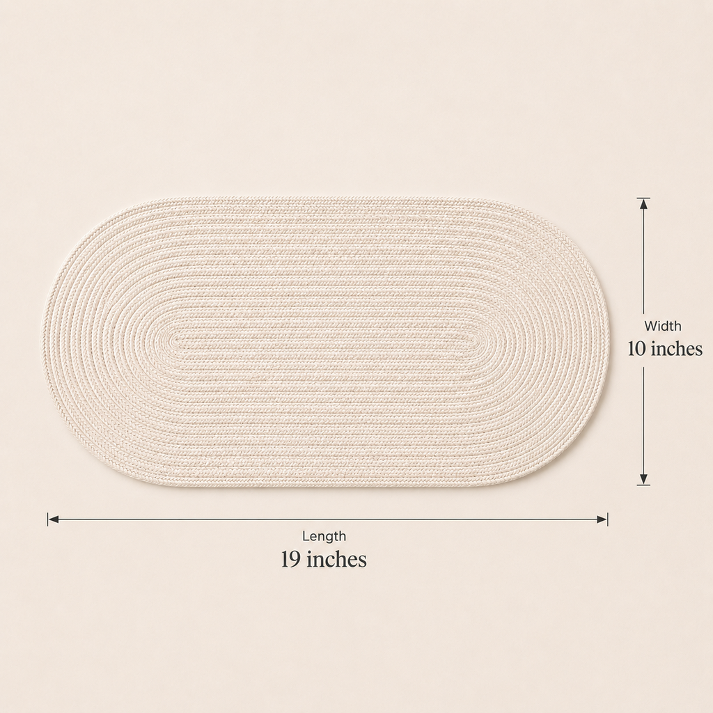 Alabaster oval cotton cord table mat showing 19 inch length and 10 inch width