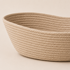 Close-up of solid beige cotton cord fruit basket texture