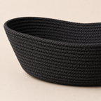 Close-up of solid black cotton cord fruit basket texture