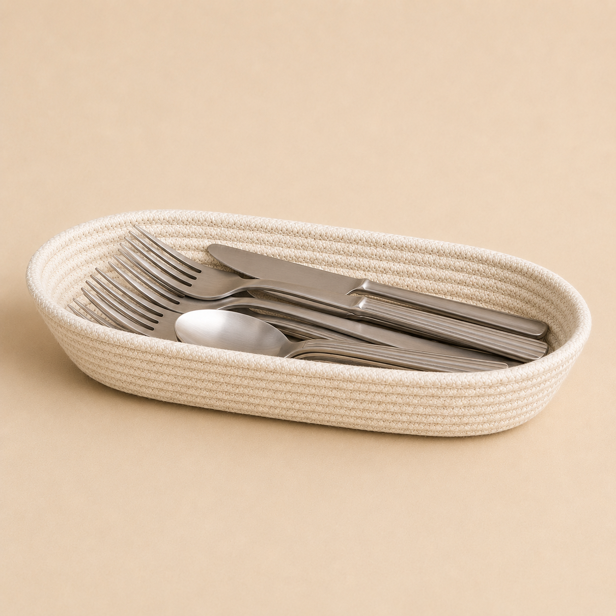 Alabaster cotton cord cutlery holder styled with silver cutlery by Leila Lanka